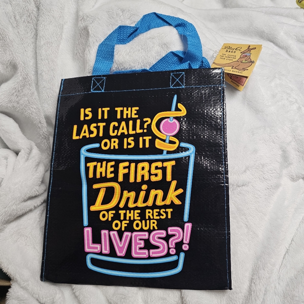 Blue Q Is It The Last Call Or The First Drink Of The Rest Of Our Lives Tote